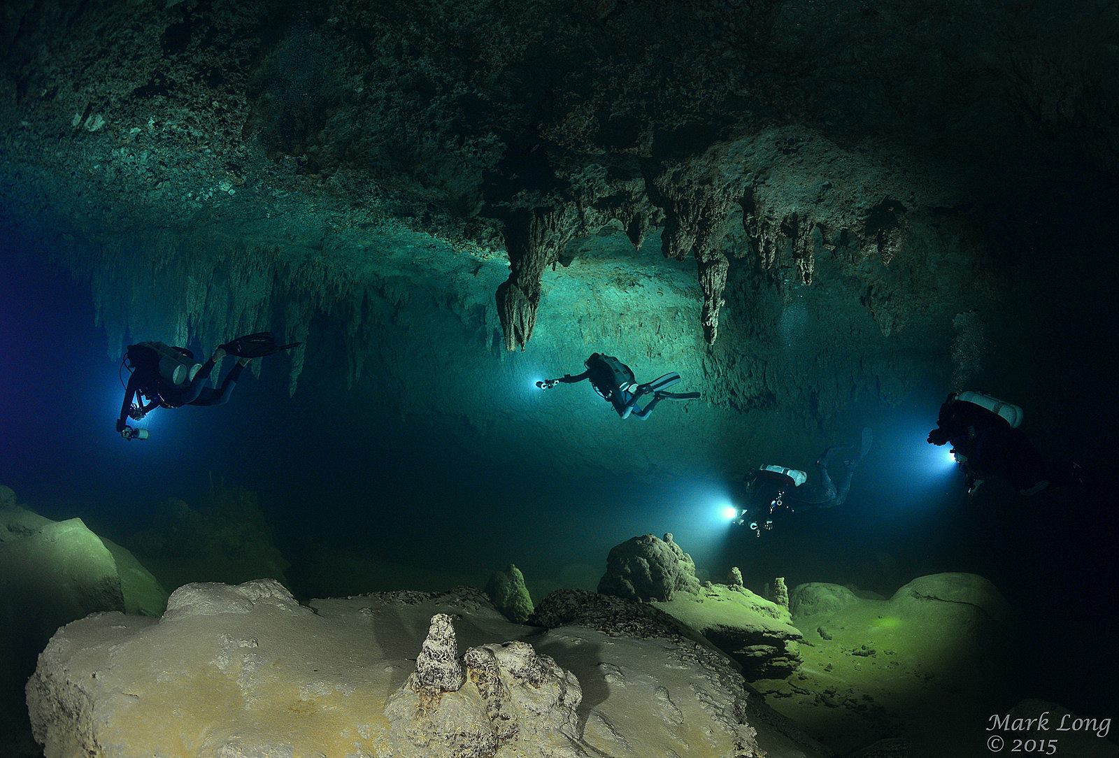 Divers exploring Giant Cave passage, Belize 2015