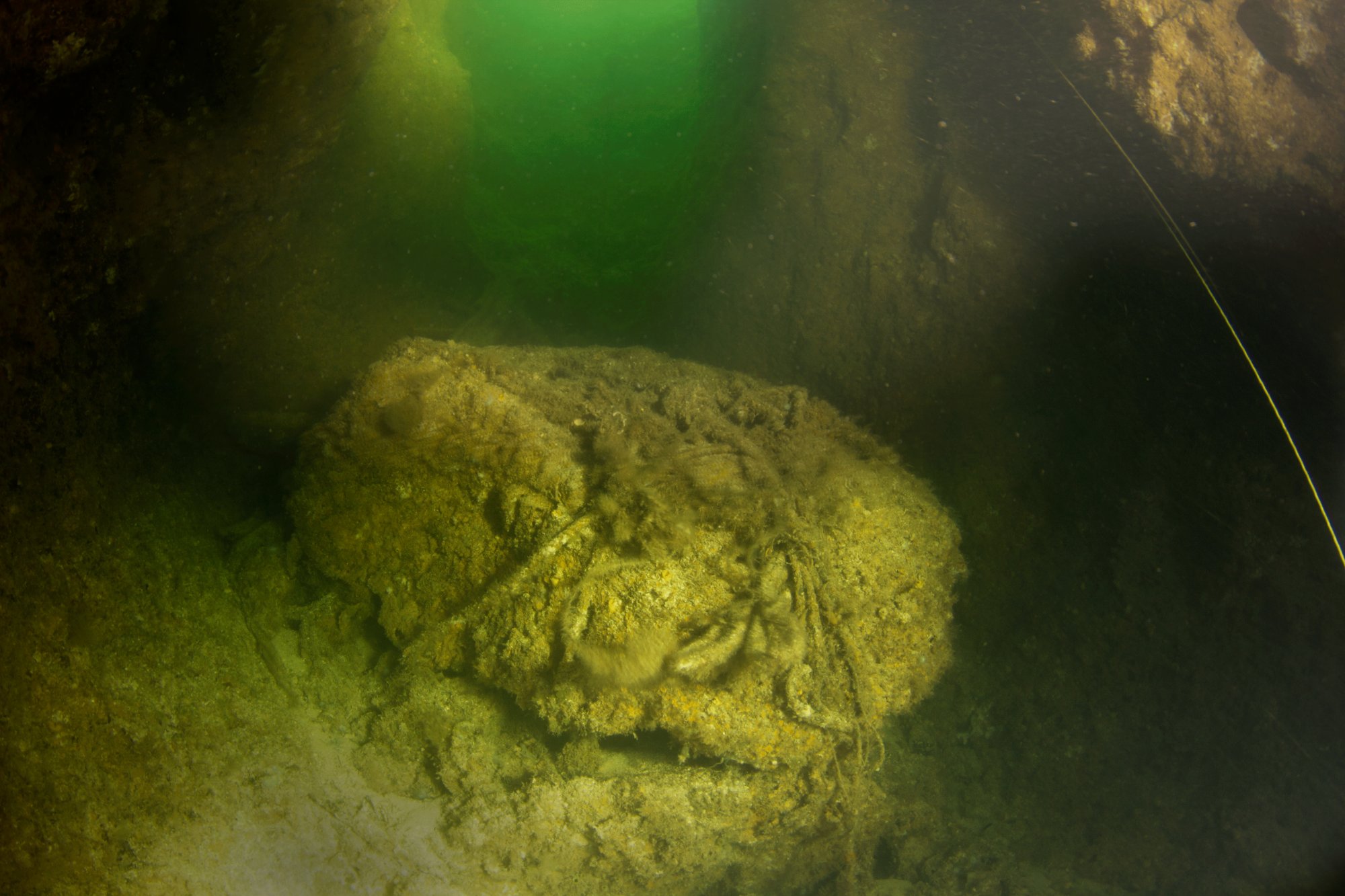 Paul's Boulder — the limestone boulder Paul Heinerth removed from the cave entrance in 1973