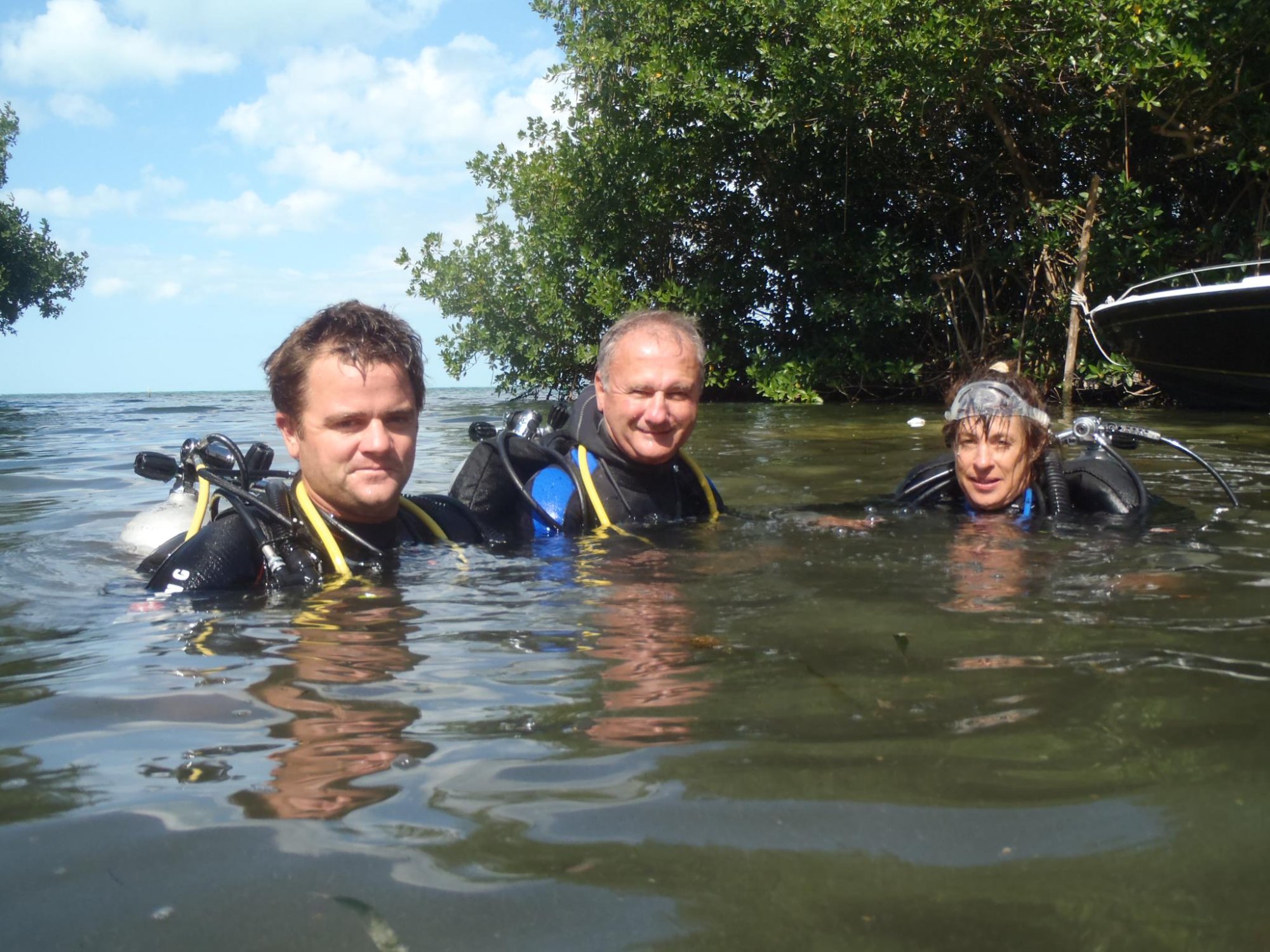 Chip Petersen, Bill Oestrich and Diane Oestrich at the Giant Cave entrance, Caye Caulker